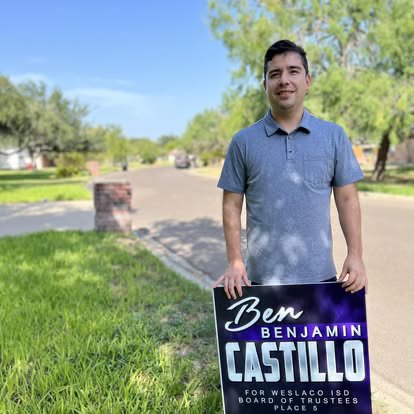 Ben Castillo with his yard sign